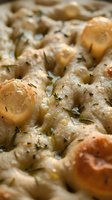 Roasted mushrooms with garlic, herbs and olive oil. Close-up of cooked fungi with rosemary and thyme for cooking, food photography and culinary content.