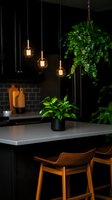 Modern dark kitchen interior with pendant lights, houseplants, and wooden bar stools. Minimalist design features black cabinets and gray countertops creating moody atmosphere.