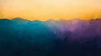 Dramatic mountain silhouettes against vibrant sunset sky with gradient colors from golden yellow through turquoise to deep purple, creating serene nature backdrop.
