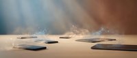 Hot stone spa therapy with steam and light rays creating relaxing wellness atmosphere for massage and meditation treatments.