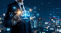 Professional businessman touching digital justice scale interface with legal icons against city skyline background at night for law technology concepts.