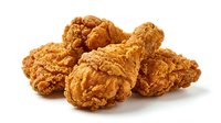 Crispy fried chicken pieces with golden-brown breading isolated on white background, ready for food packaging, restaurant menus, and culinary design projects.