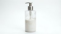 Liquid soap or lotion dispenser with white product and metallic pump on isolated white background, ready for packaging design and product mockups.