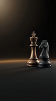 Chess pieces king and knight on dark background with dramatic lighting for strategic business concepts and competitive thinking.