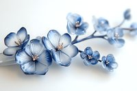 Delicate blue cherry blossom branch with gradient petals and silver stamens on white background, elegant floral composition for wedding and spring designs.