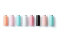 Row of colorful aluminum cans in pastel and neutral colors on white background, mockup for beverage or cosmetic product design.