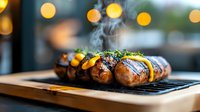 Grilled sausages with fresh herbs and orange slices on wooden cutting board, steam rising, bokeh lights background creates cozy atmosphere. Restaurant menu photo.