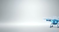 Futuristic blue drone with transparent body and propellers on white background, isolated for technology and innovation design projects.
