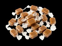 Wrapped caramel candies pile isolated on transparent background, ready for sticker, clipart, print on demand, sublimation, and t-shirt design use.