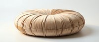 Round beige velvet floor cushion with tufted texture, isolated on white background, perfect for interior design and home decor product presentations.