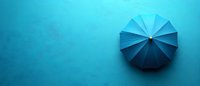 Geometric paper folding art in gradient blue shades creating circular fan pattern on turquoise background with dramatic lighting and copy space.