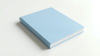 Closed hardcover notebook with light blue cover and white pages, isolated on white background, ready for design mockups and branding presentations.