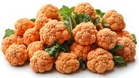 Fresh orange cauliflower florets with green leaves isolated on white background, organic farm vegetables for healthy cooking and nutrition.