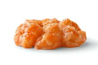 Fresh cooked shrimp arranged in row on white background, bright orange color and glossy texture, isolated seafood for culinary designs and menus.