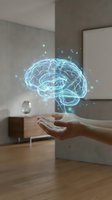 Holographic brain floating above open hands in modern interior representing artificial intelligence, neuroscience, mental health and innovative technology concepts.