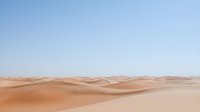 Vast desert landscape with rolling sand dunes under clear blue sky, suitable for travel, nature, and background design projects.