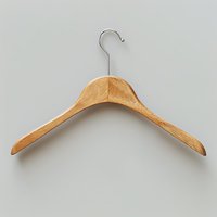 Wooden coat hanger with metal hook isolated on white background, ready for retail, fashion, and clothing display design projects.