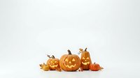 Carved jack-o-lantern pumpkins with glowing faces arranged on white background, ready for Halloween decorations, greeting cards, and seasonal marketing materials.