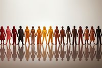 Diverse group of colorful paper cutout figures holding hands in unity row with reflection, perfect for diversity, inclusion and community concepts in business presentations.