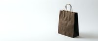 Brown paper shopping bag with handles isolated on white background for retail packaging and eco-friendly commerce design projects.