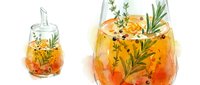 Refreshing citrus cocktail with fresh rosemary sprigs, berries, and ice cubes in clear glasses, perfect for beverage, recipe, and summer drink concepts.