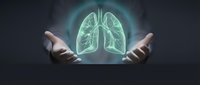 Hands protecting glowing green lungs hologram representing respiratory health, medical care, pulmonology and healthcare technology concepts for wellness campaigns.