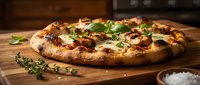 Freshly baked pizza with melted cheese, herbs and toppings on wooden surface, ready for serving and dining occasions.