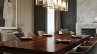 Modern executive conference room with dark wood table, contemporary pendant lighting, marble fireplace, and neutral upholstered chairs for corporate meetings and business presentations.
