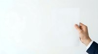 Caucasian male hand in dark business suit sleeve pointing at blank white wall or board, suitable for presentations, business concepts, and corporate messaging.