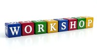 Colorful wooden alphabet blocks spelling WORKSHOP arranged in row on white background. Educational toy concept for learning and skill development programs.