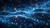Abstract glowing blue particles with orange bokeh lights flowing in wave formation against dark background, creating magical atmospheric effect.