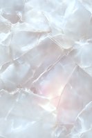 Luminous white marble texture with subtle pink undertones and natural veining creates elegant surface pattern for luxury interior design backgrounds.