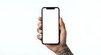 Hand holding modern smartphone with blank white screen mockup for app presentation and mobile interface design on neutral background.
