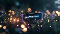 Glowing innovation sign with bokeh lights and sparkles against dark background creates magical atmosphere for business and technology concepts.