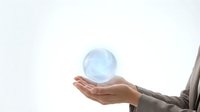 Businessperson holding glowing globe sphere in palm, representing global business, sustainability, and corporate responsibility for presentations and marketing materials.