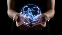 Hands holding glowing holographic sphere with swirling energy patterns and light trails, futuristic technology concept for digital innovation and virtual reality.