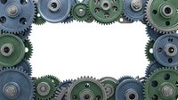 Industrial mechanical gears frame with white center space for text or design elements. Perfect for engineering, manufacturing and technology concepts.