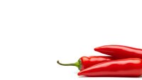 Fresh red chili peppers isolated on white background for culinary and cooking designs.