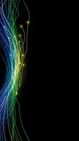 Abstract flowing light trails in blue green yellow colors on black background for digital art technology design projects.