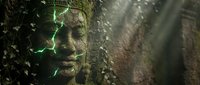 Ancient stone face sculpture covered with green ivy vines in mystical forest setting with dappled sunlight creating atmospheric mood for spiritual concepts.
