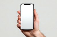 Male hand holding modern smartphone with blank white screen mockup for app presentation and digital marketing campaigns.