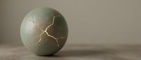 Cracked concrete sphere with golden lightning fractures on neutral background, suitable for design, wallpapers, and creative projects.