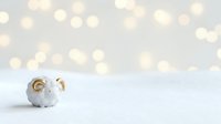 Cute white ceramic piggy bank with gold accents and bokeh lights background, perfect for savings, finance, and children's design projects.