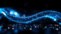Glowing blue wave of magical sparkles and light particles flowing on black background with bokeh effect creates mystical atmosphere.