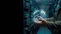 Network administrator managing futuristic holographic globe interface in modern server room with glowing digital connections and data visualization technology.