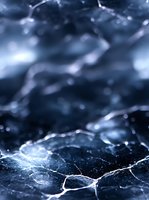 Cracked ice surface with glowing fissures in dark blue tones creates dramatic winter texture, abstract pattern of frozen lake with illuminated crevices and bokeh effect.