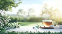 Steaming cup of herbal tea on white table outdoors with blurred spring garden background, morning sunlight and blooming flowers creating serene atmosphere.
