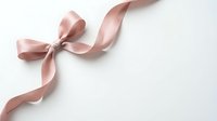 Elegant pink satin ribbon bow on white background, isolated for gift wrapping, wedding decoration, fashion design and crafting projects.