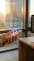 Hands presenting holographic data processing workflow with digital icons floating above palms in modern office environment for business technology concepts.