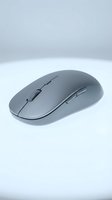 Gray wireless computer mouse isolated on white background, suitable for technology, office, and business design projects.